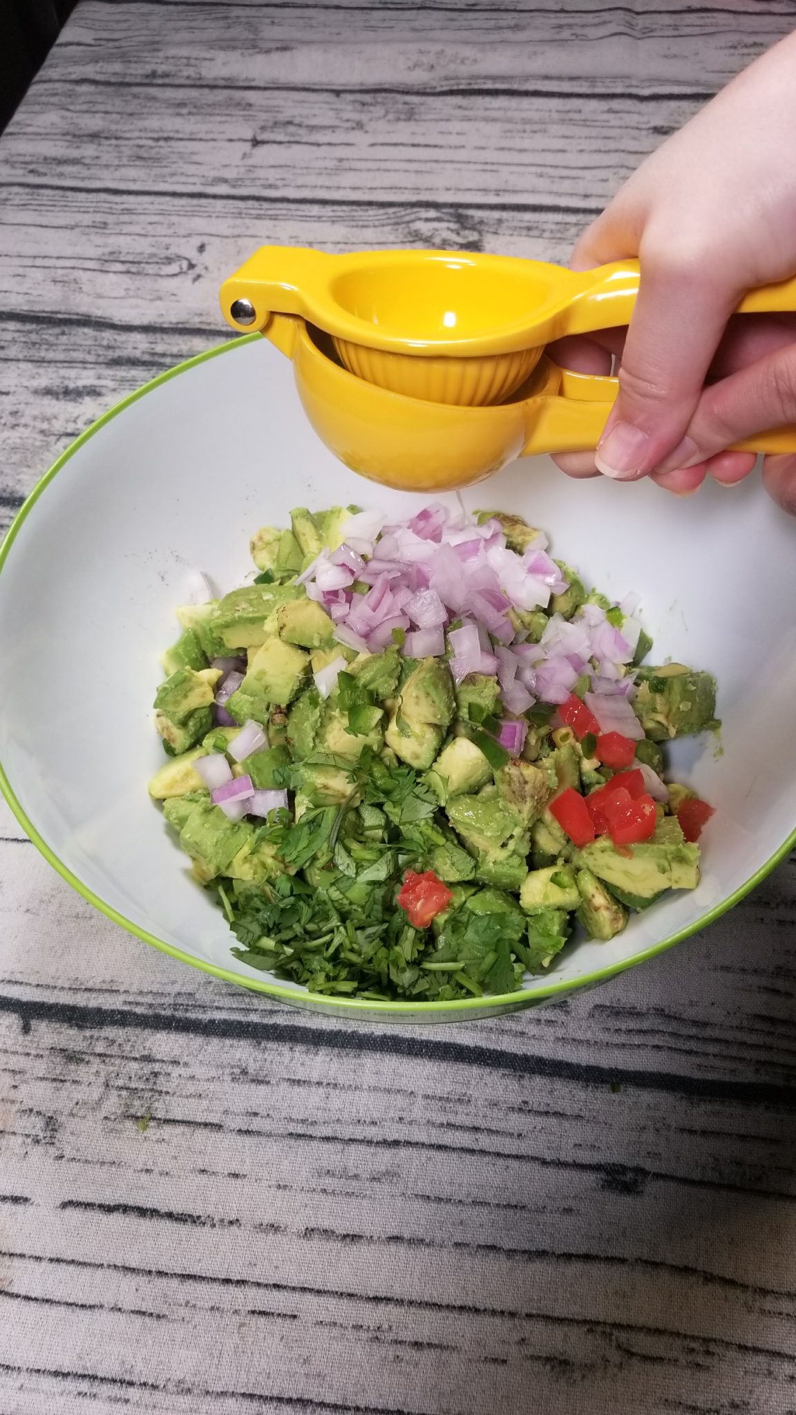 Squeezing limes on guacamole