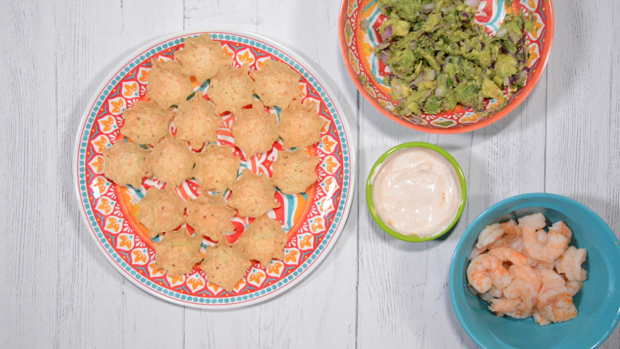 Tortilla chip scoops, guac, sour cream/salsa mixture and cooked shrimp