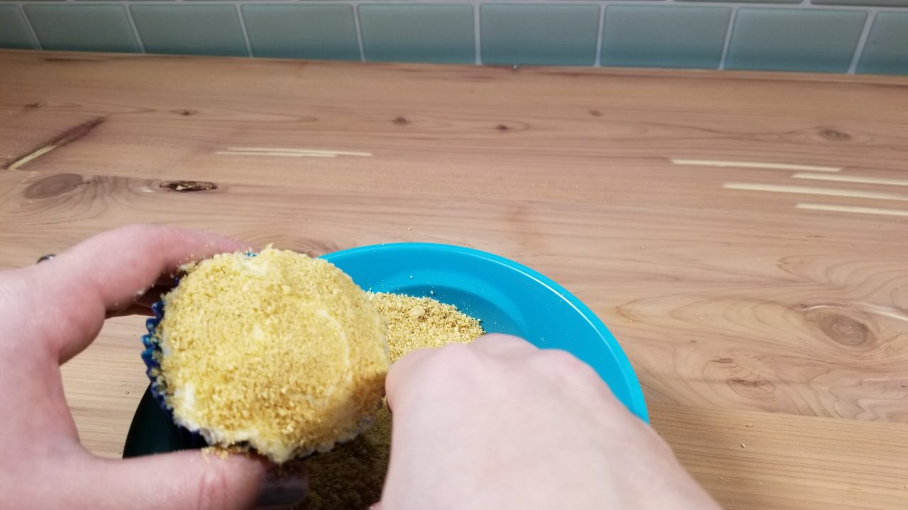 Putting Graham Cracker crumbs on cupcakes, Crab Cupcakes