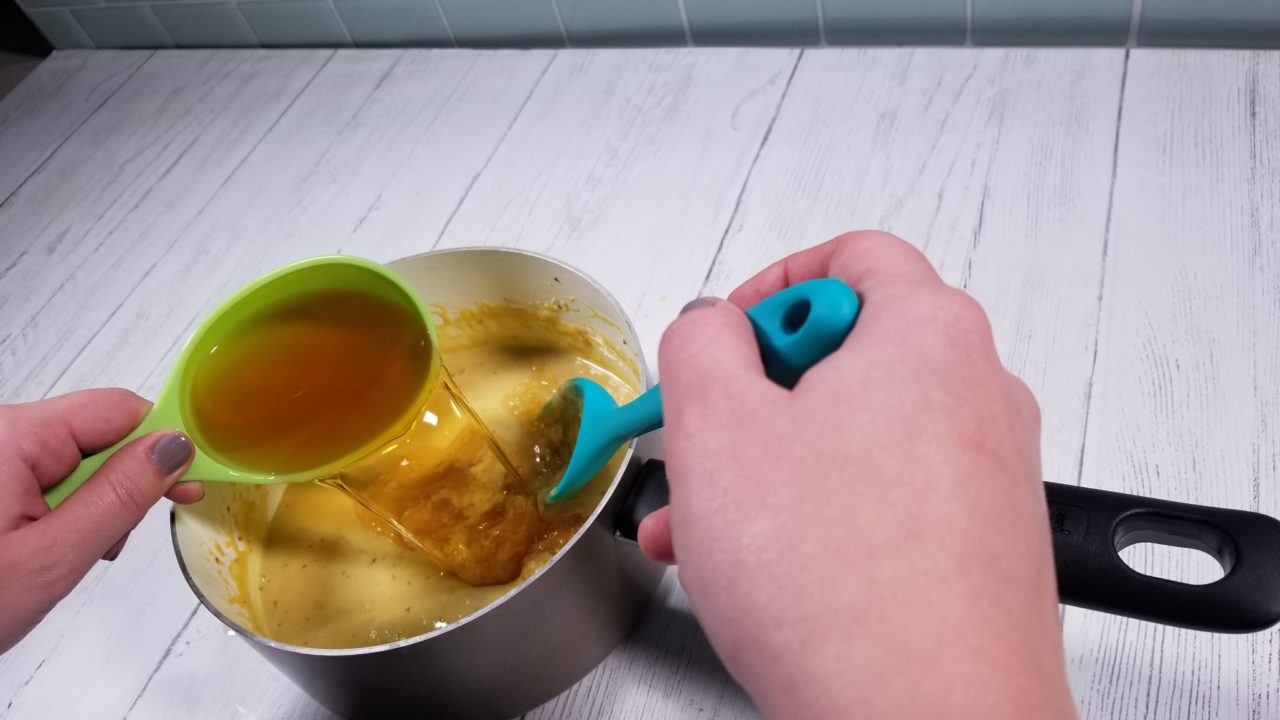 Adding rum to eggs and milk mixture, Mexican Egg Nog
