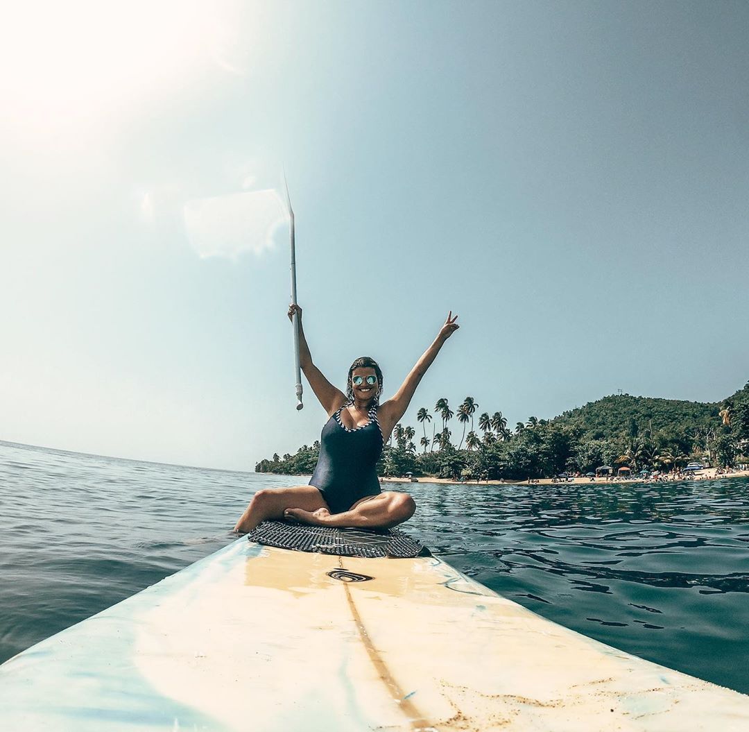 Girl on a paddle board in the ocean