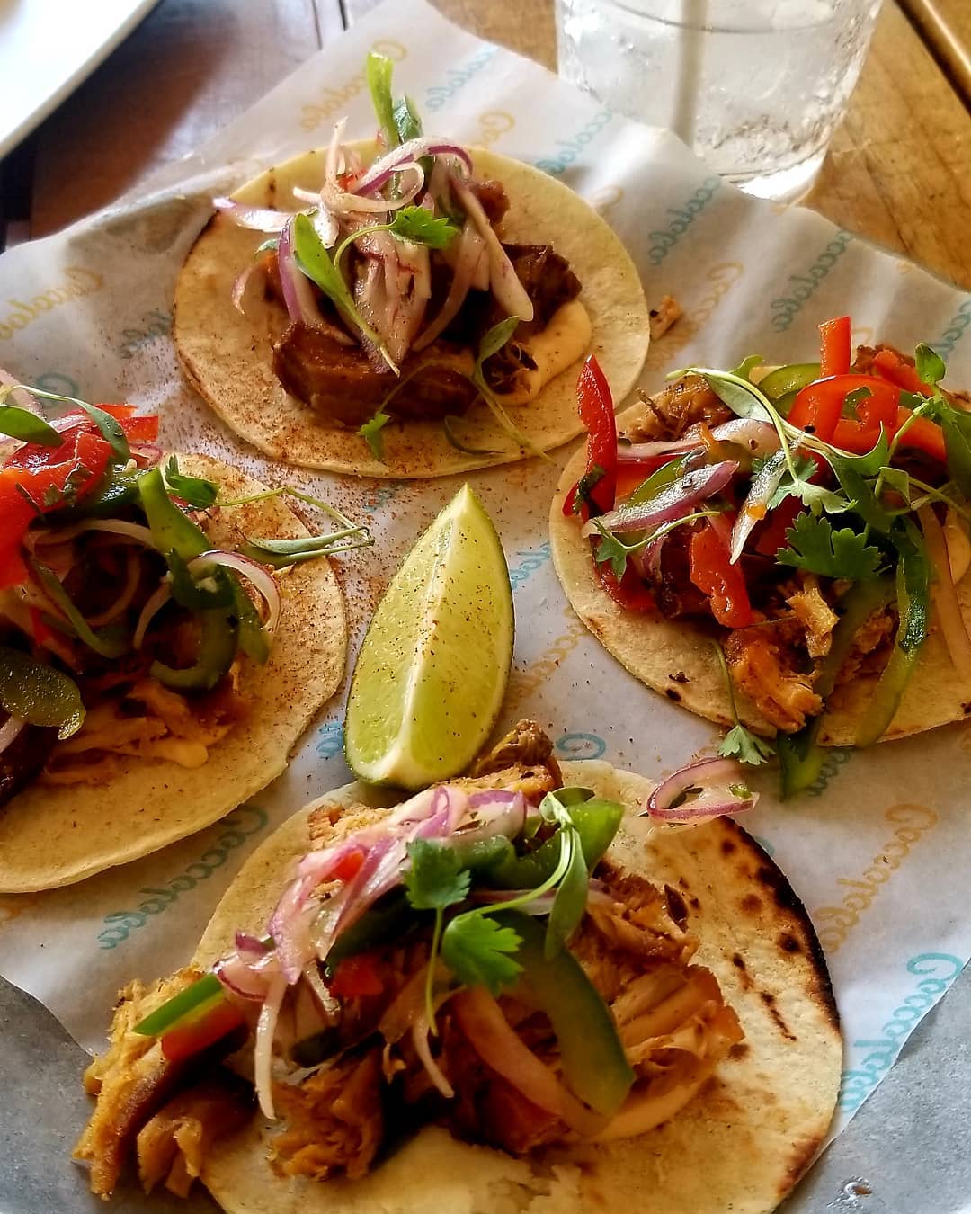 4 pork belly tacos with a lime squeeze. 