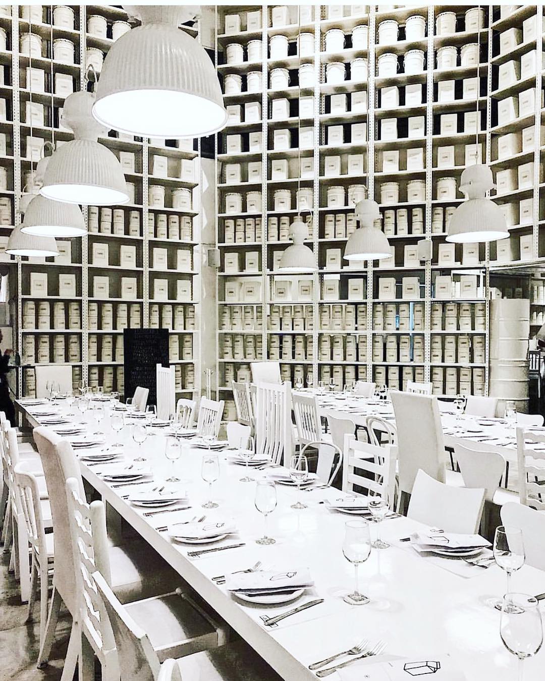 Inside of La Leche restaurant with monochromatic aesthetic. 